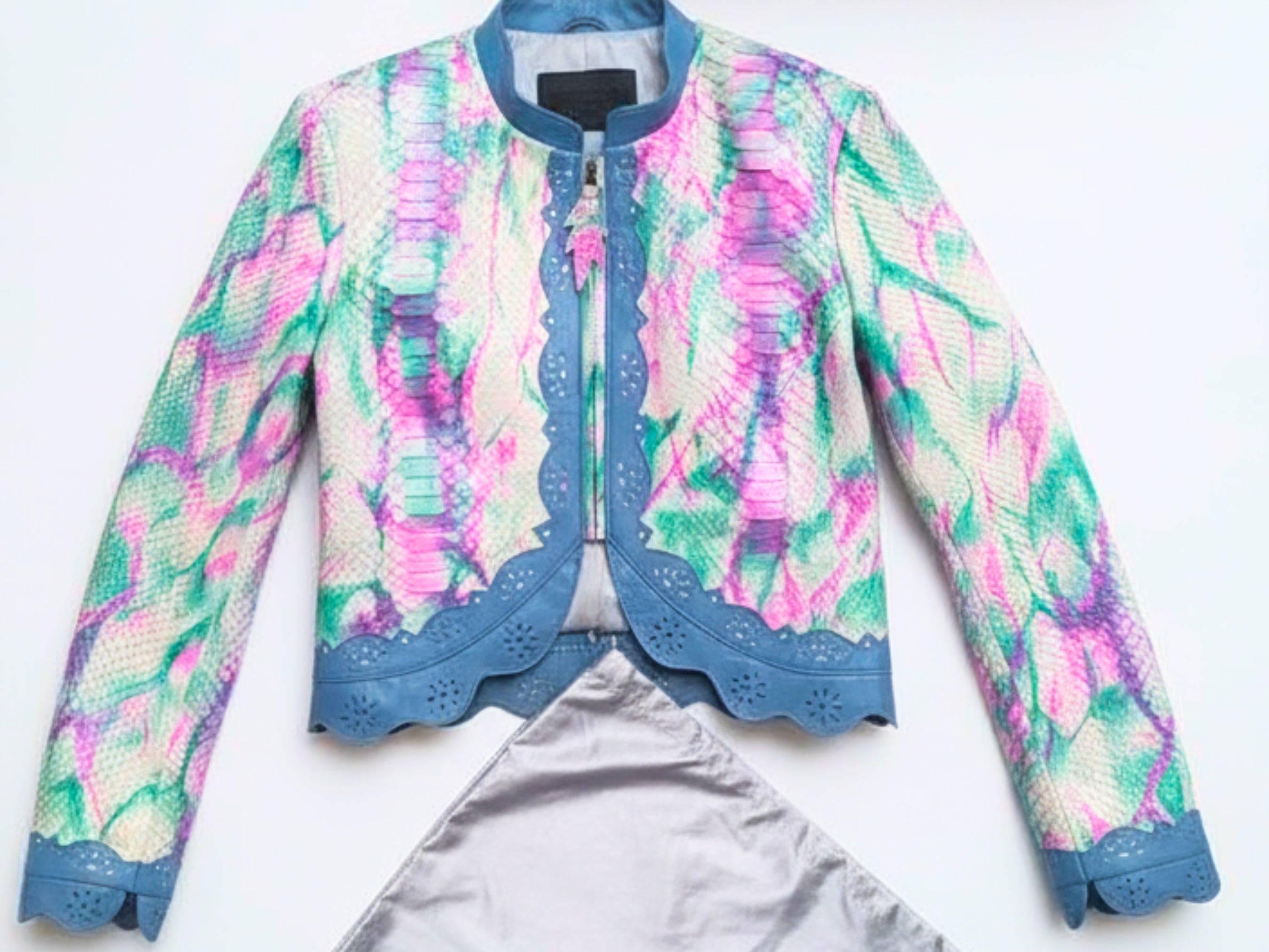 Cropped leather jacket with multicolor snakeskin tie-dye print, blue trim, zip front
