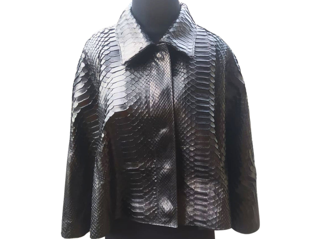 Snakeskin short leather cape with dark and silver snake print, front button closure, cape collar