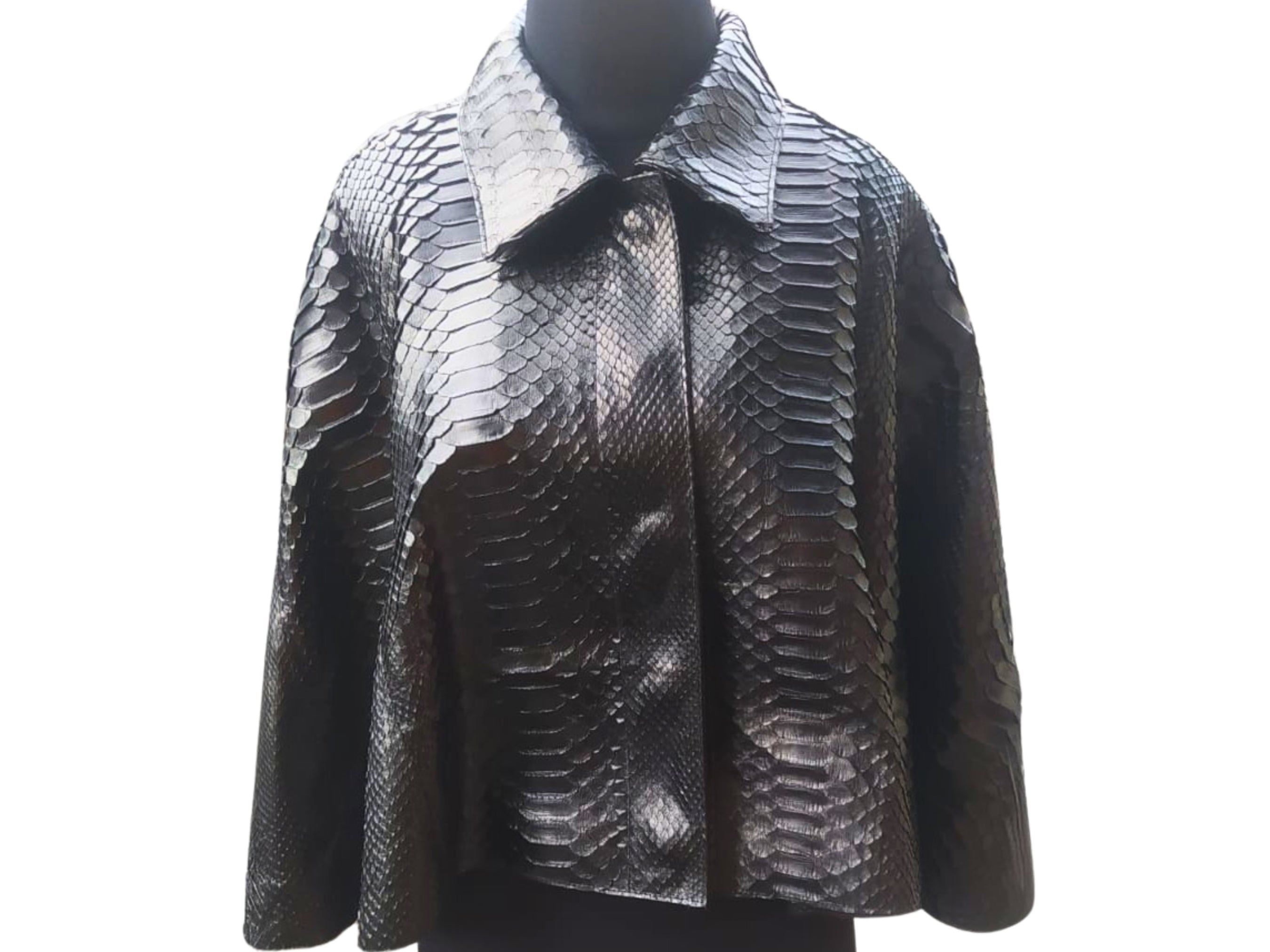 Snakeskin short leather cape with dark and silver snake print, front button closure, cape collar