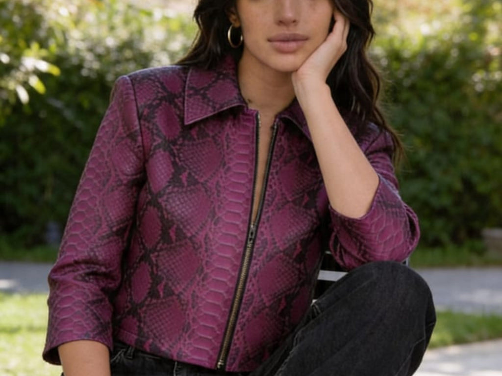 Magenta snakeskin cropped leather jacket with zip front and pointed collar
