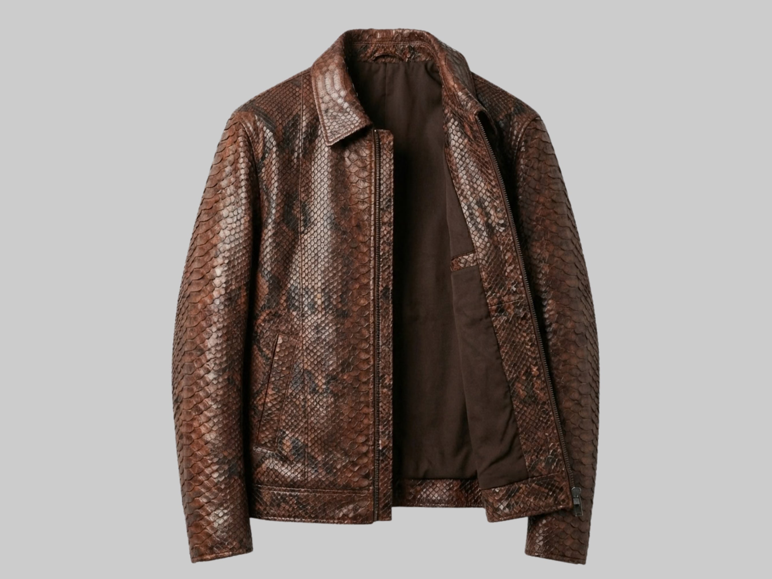 Brown python snakeskin jacket with zip front, open showing dark inner lining