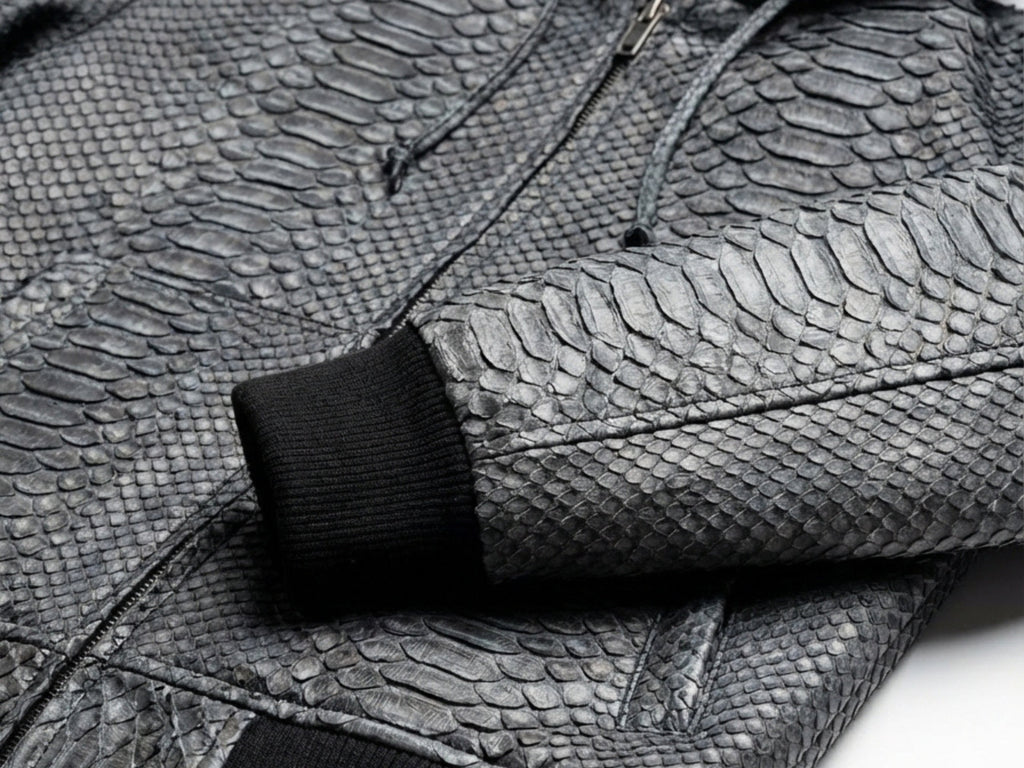 Python snakeskin bomber jacket close-up of textured pattern and black zipper