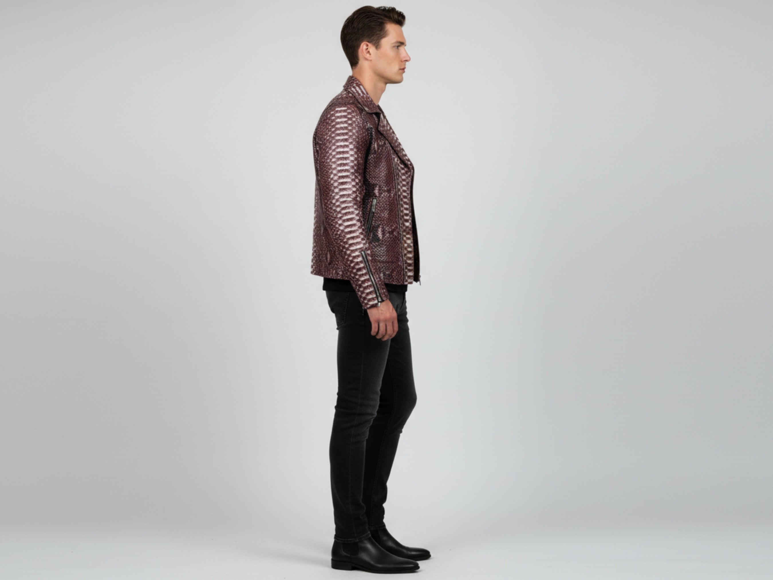 Men’s snakeskin leather biker jacket side profile, gradient burgundy and structured lapels