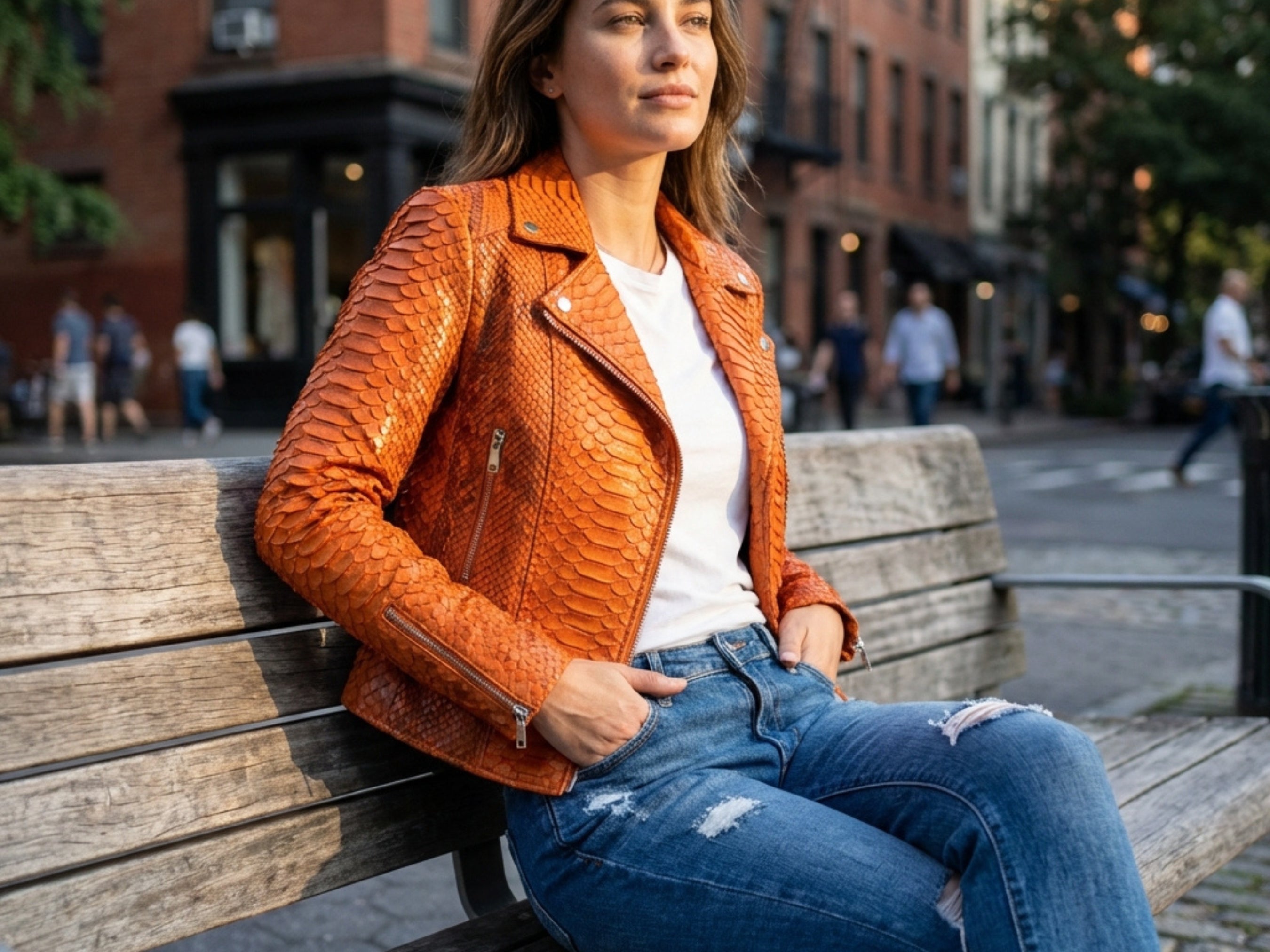 Burnt orange snakeskin-texture leather biker jacket with zip front, notch lapels, silver hardware