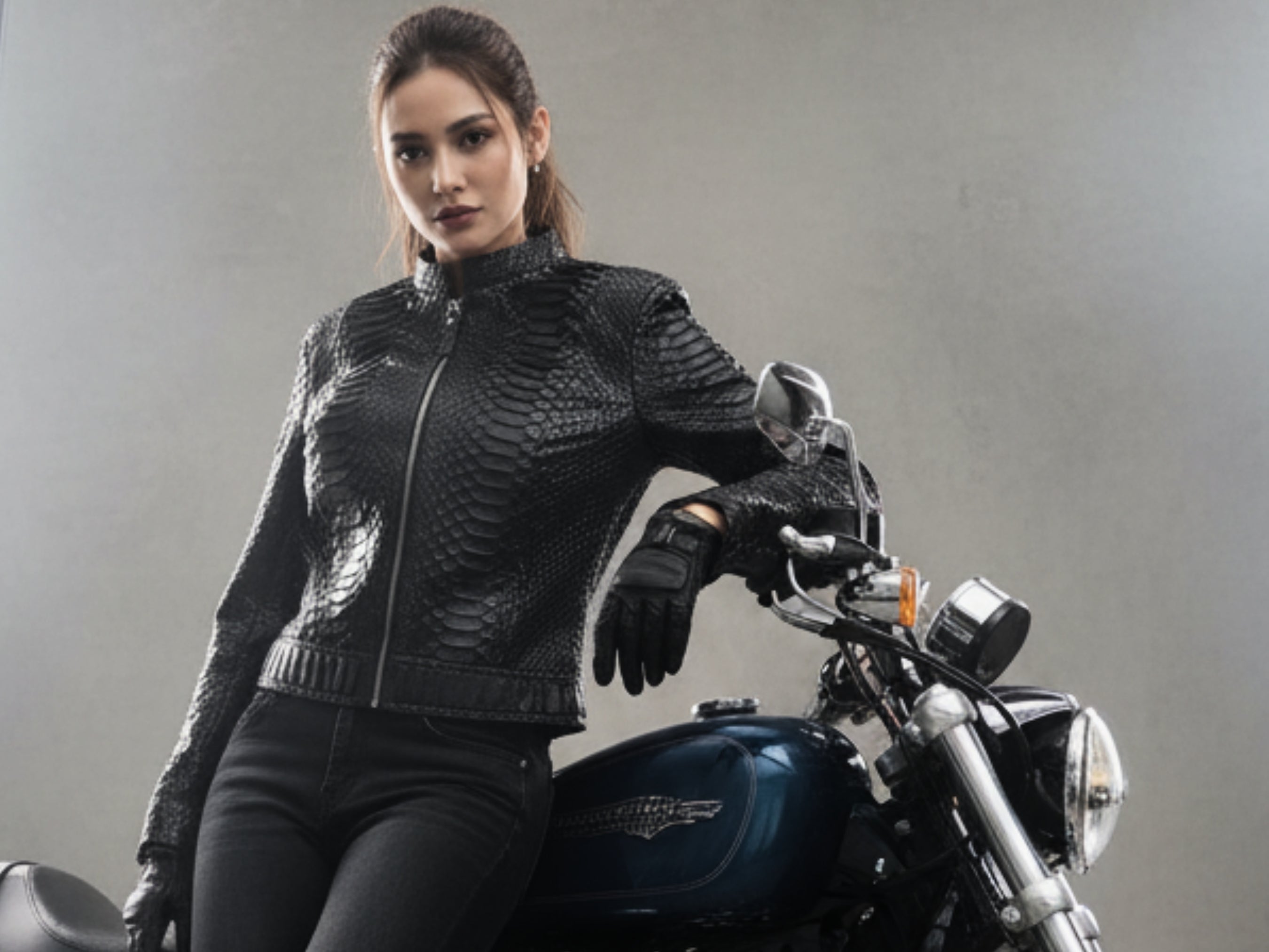 Black snakeskin leather motorcycle jacket with front zip and stand collar