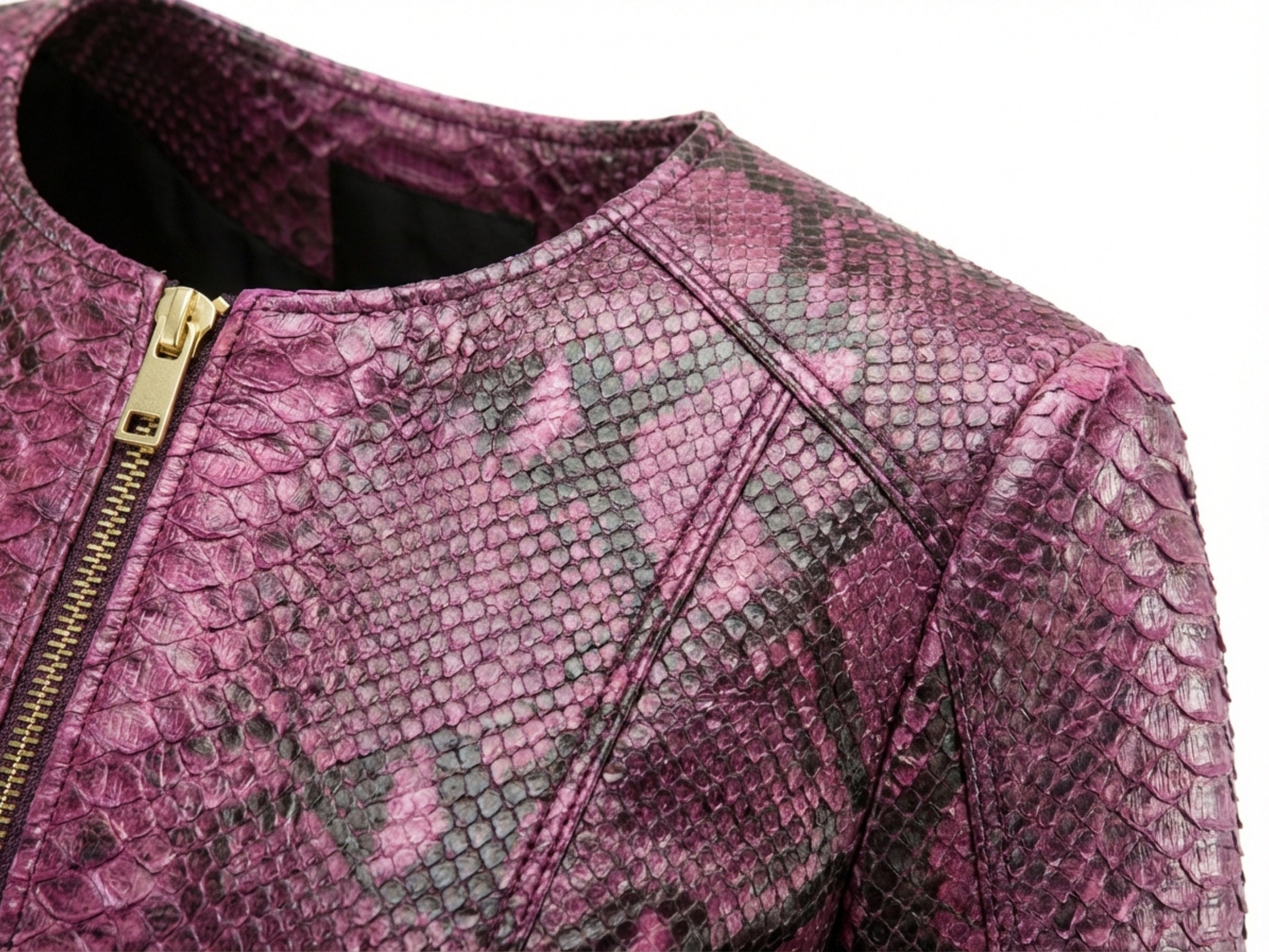 Snakeskin leather jacket neckline close-up in pink burgundy with gold zipper trim