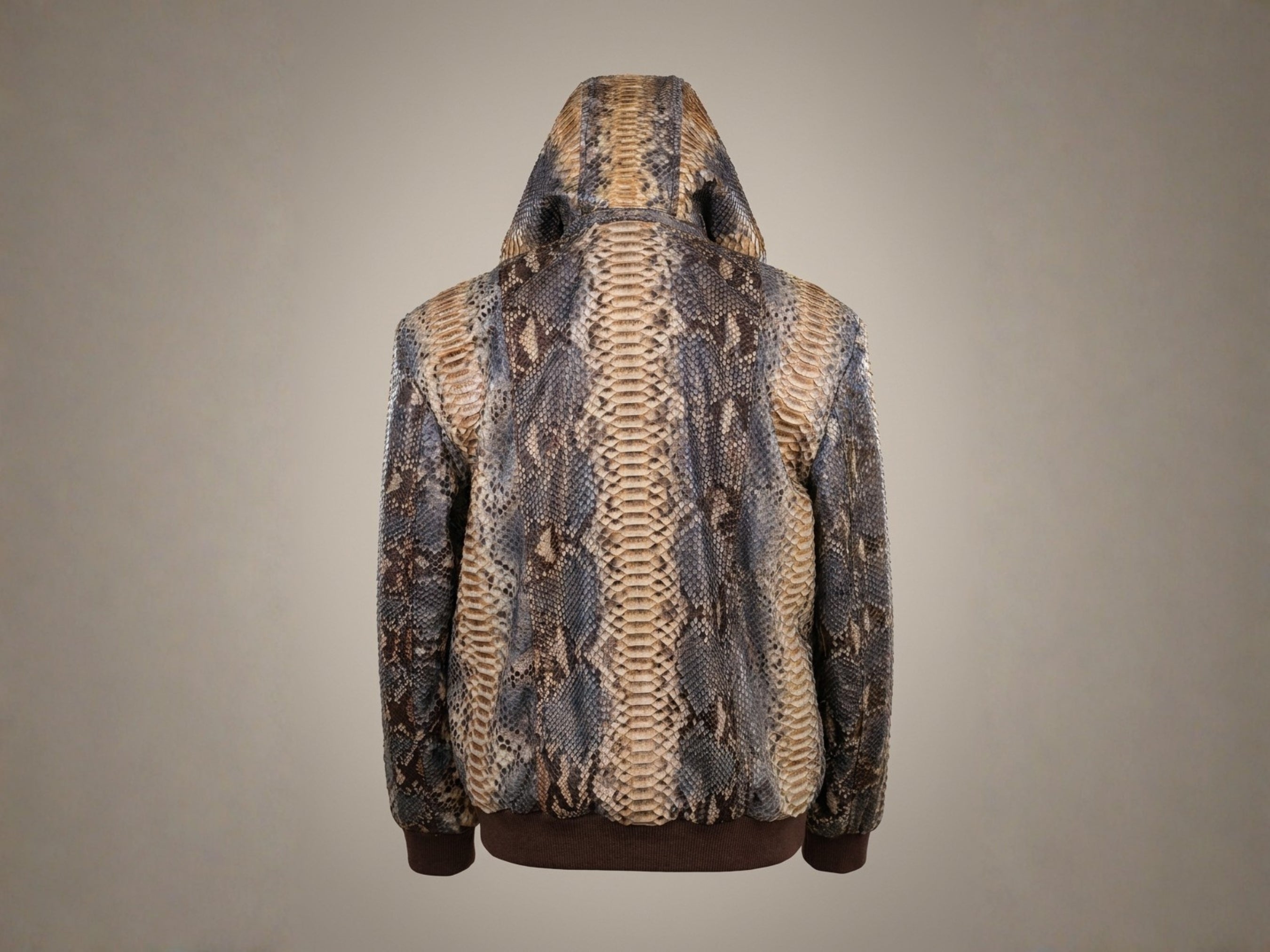 Back view of fur-trim hooded python snakeskin tracksuit jacket with ribbed hem