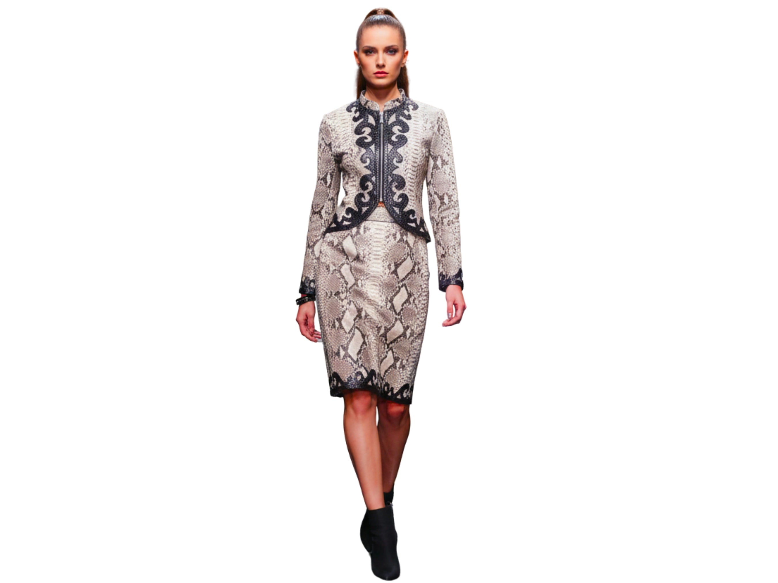 Snakeskin-print skirt and jacket set with ornate black trim and fitted silhouette
