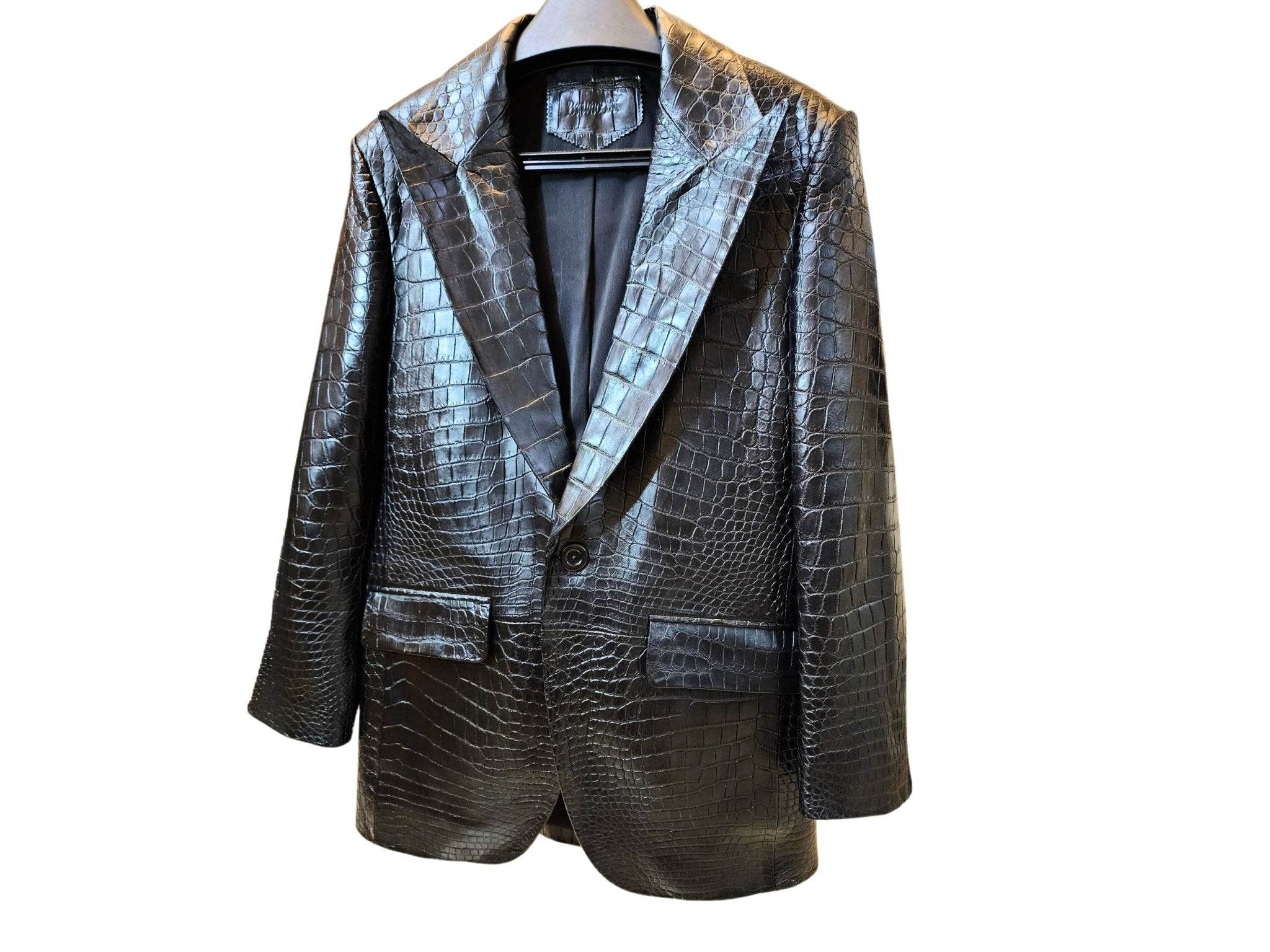 Men's alligator-skin jacket with notch lapels, flap pockets, and glossy scale-pattern texture.