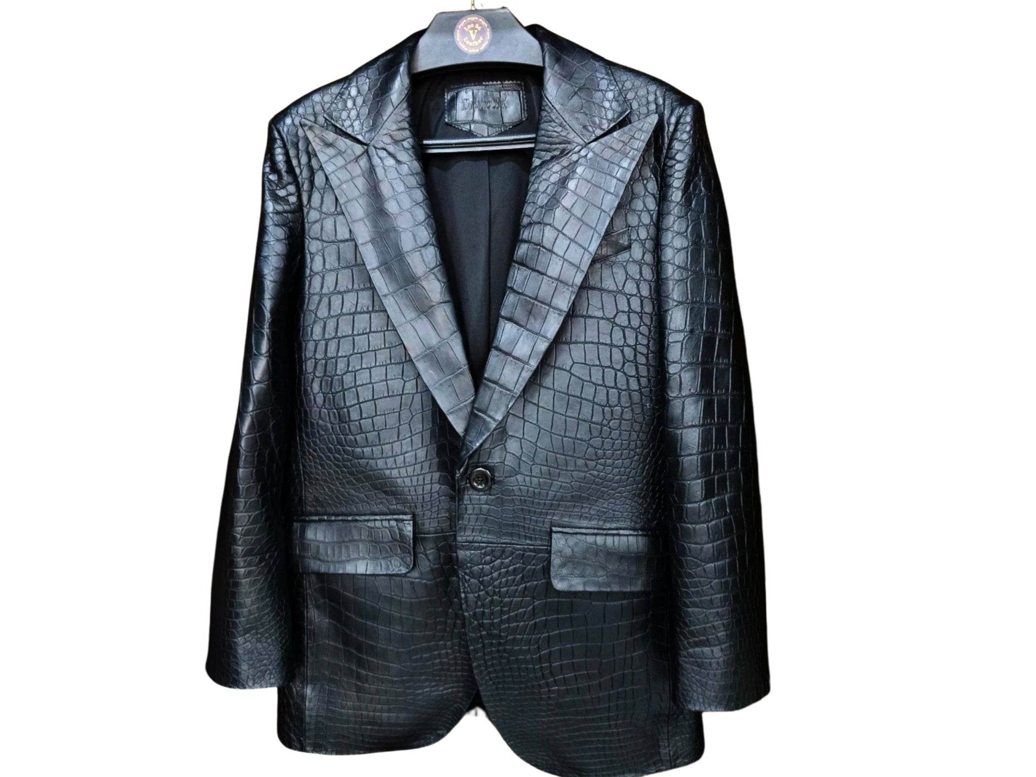 Men's alligator-skin jacket with V-notch lapels and flap pockets, single button closure.