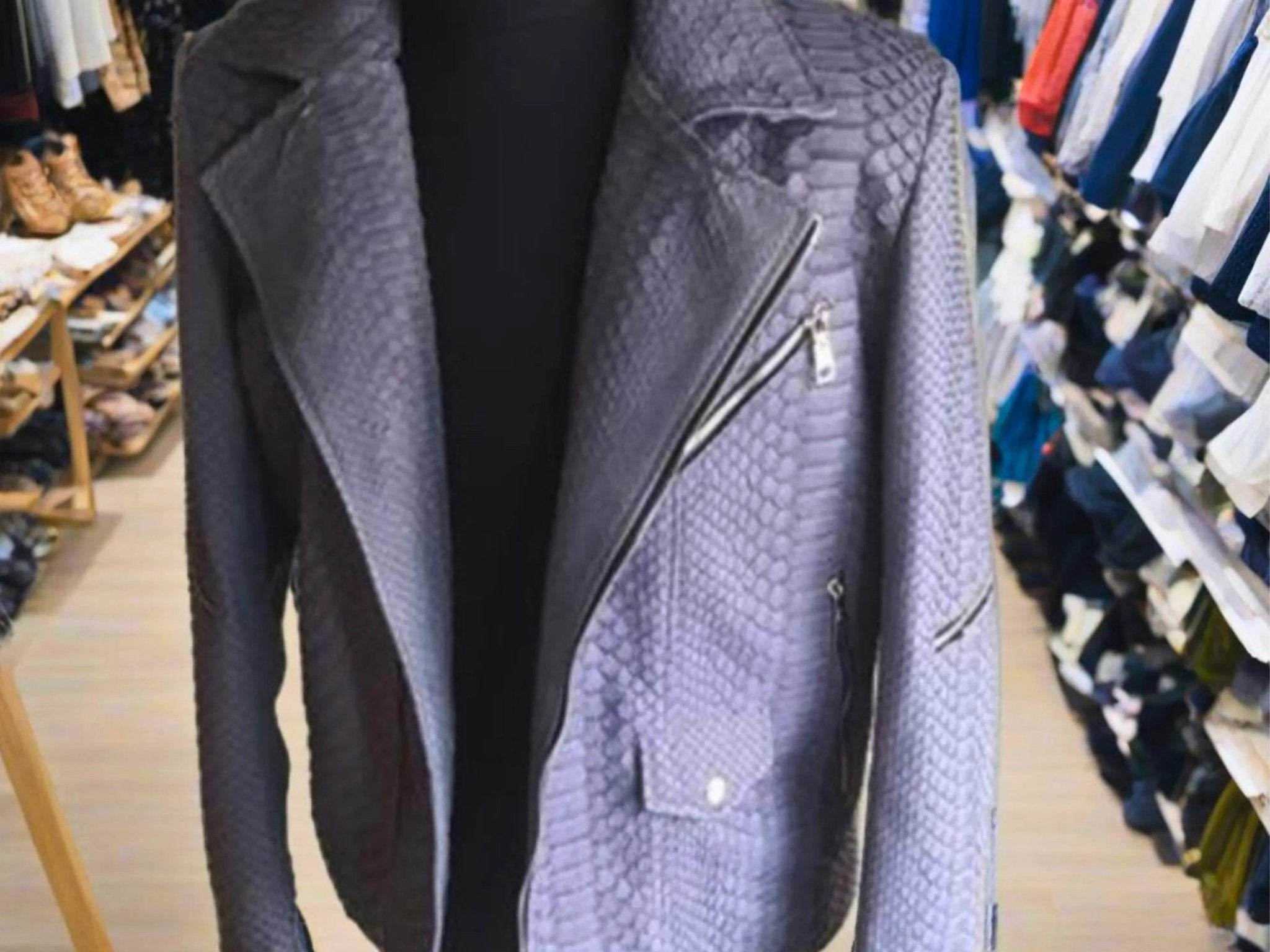 Purple snakeskin leather moto jacket with diagonal zip front and chest pockets