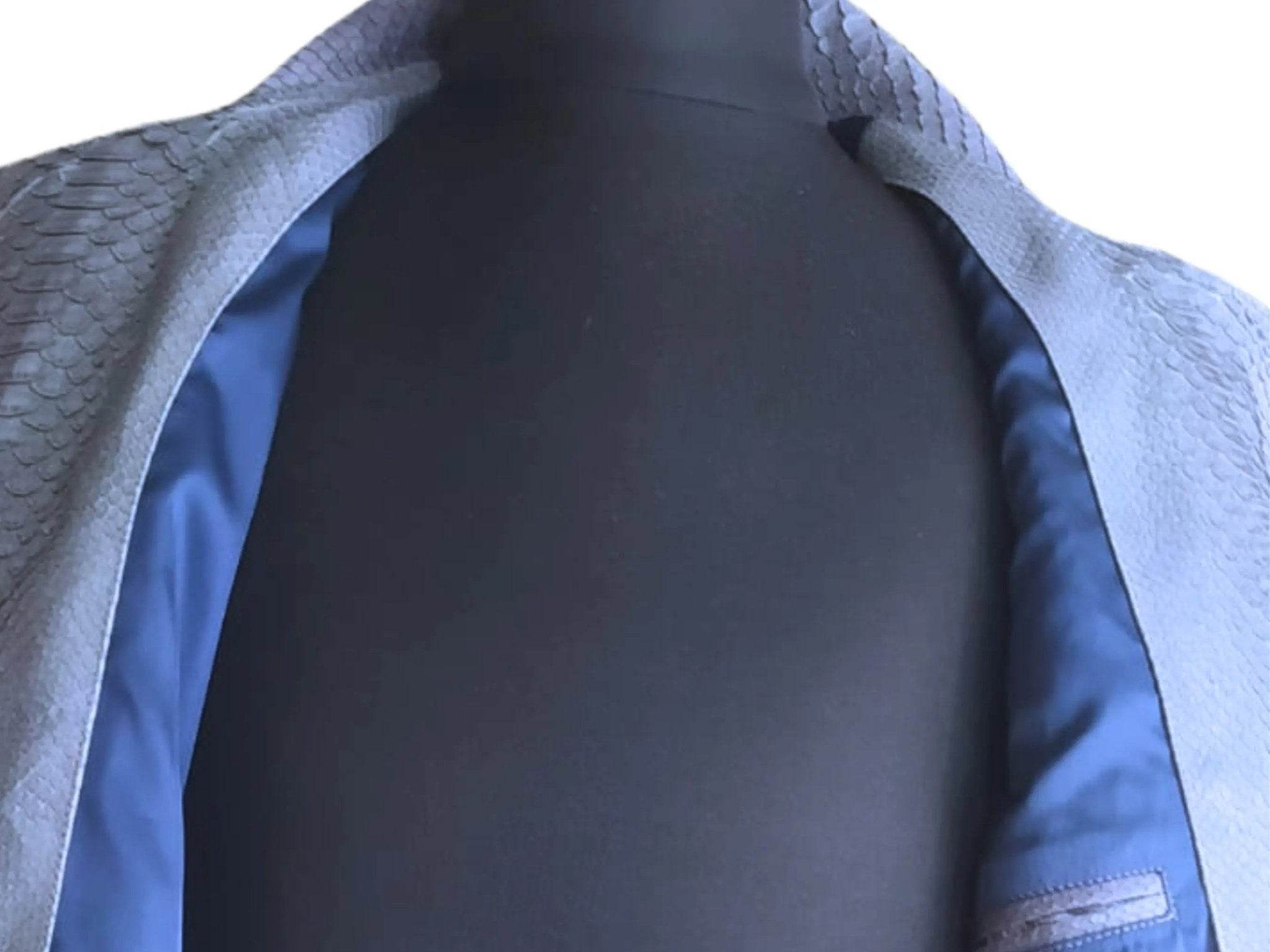 Interior view of snakeskin leather jacket, stand collar and blue satin lining