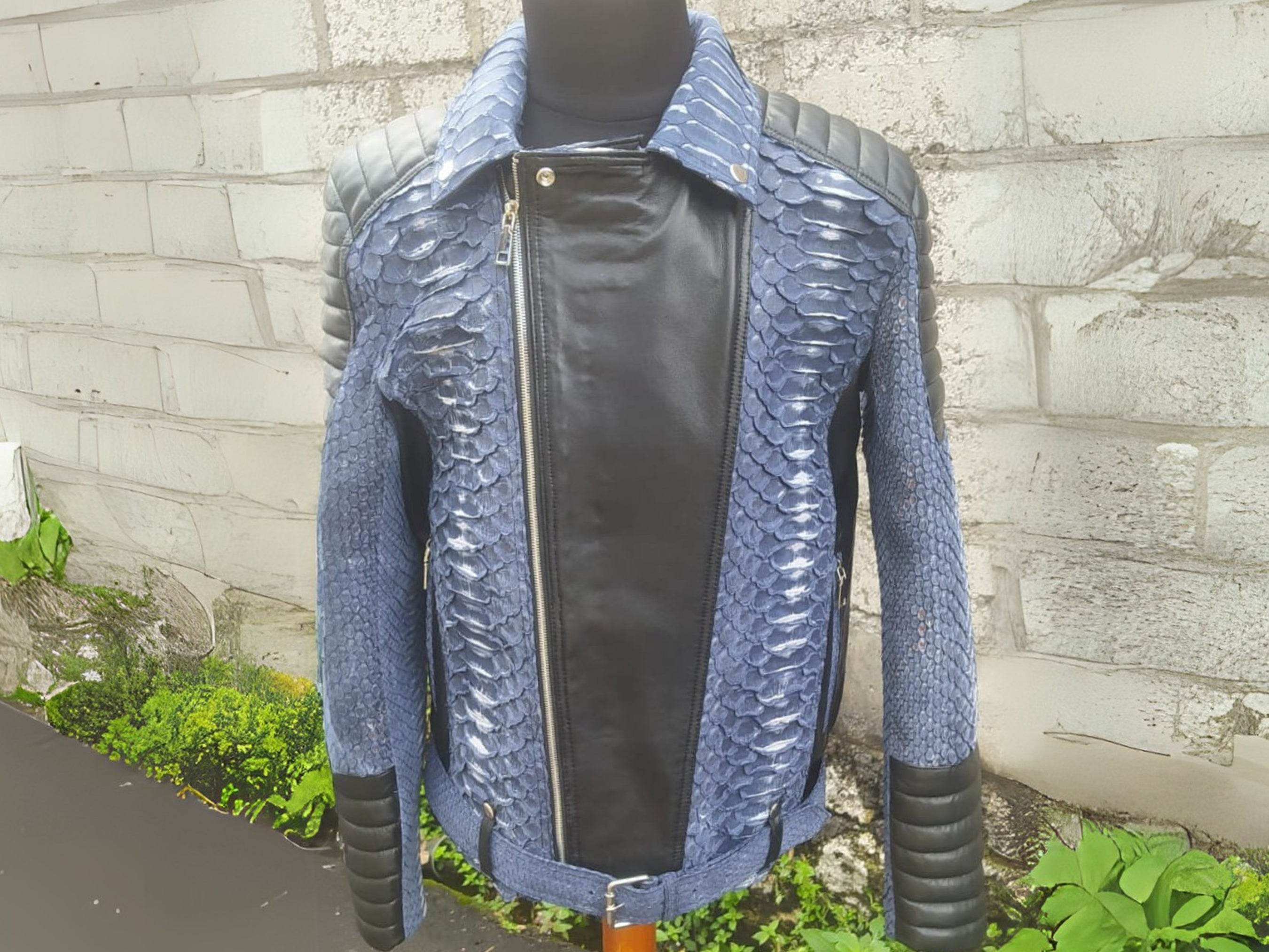 Blue biker jacket with raised python texture, black front panel, asymmetrical zip and collar