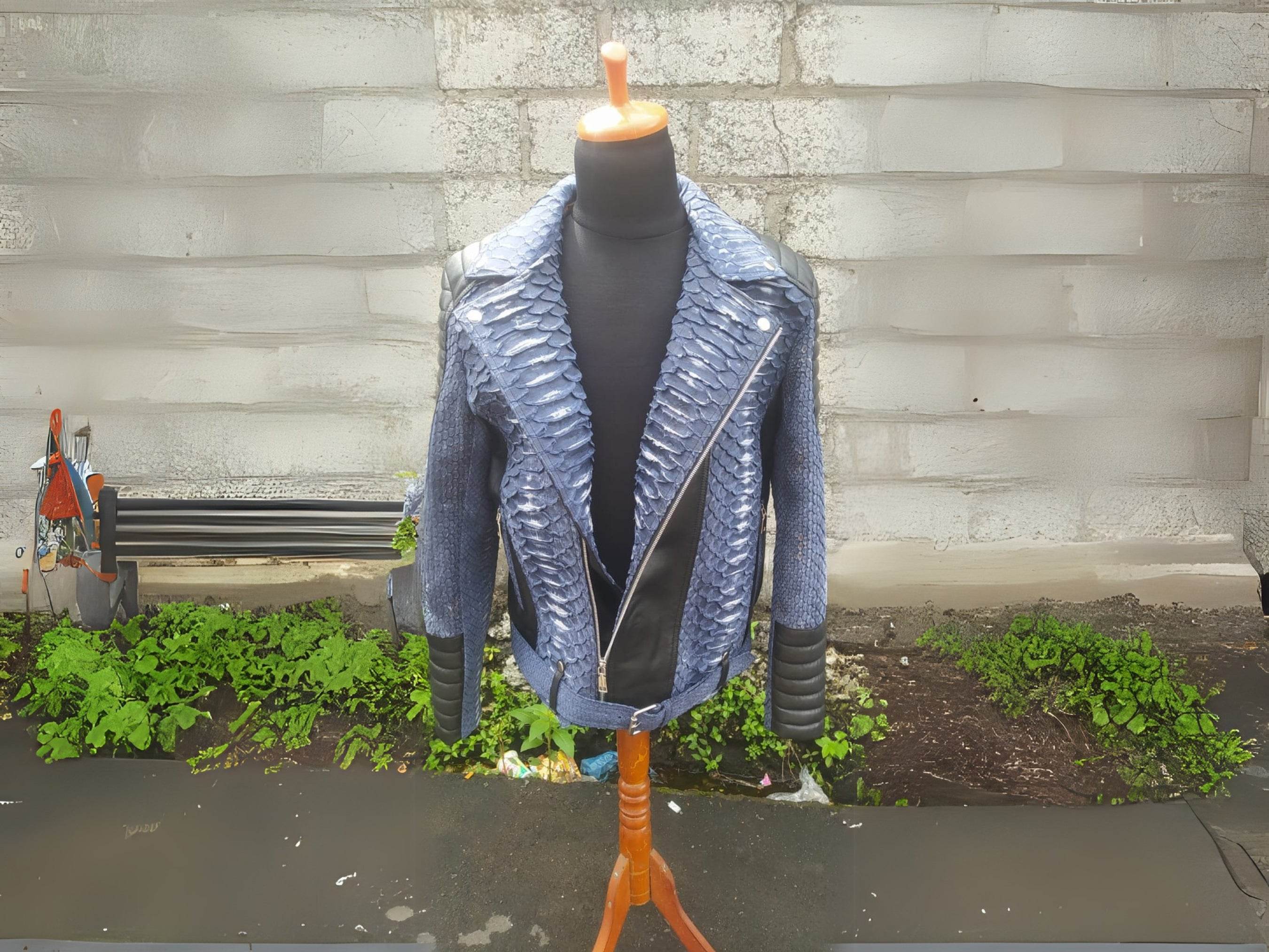 Blue python-texture biker jacket on mannequin with black diagonal zip panel and stand collar