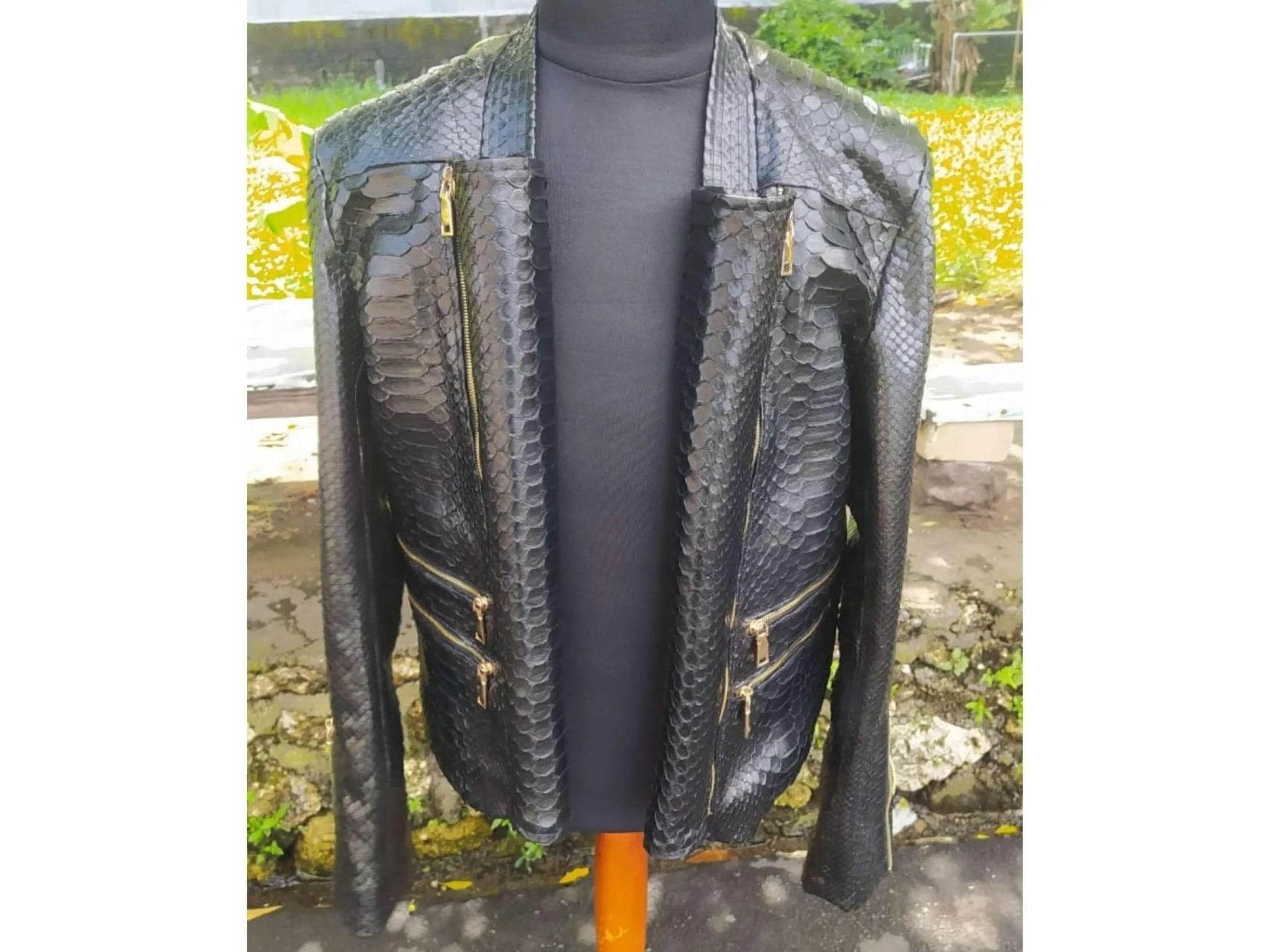 Black snakeskin leather jacket with gold-tone hardware and stand collar, front