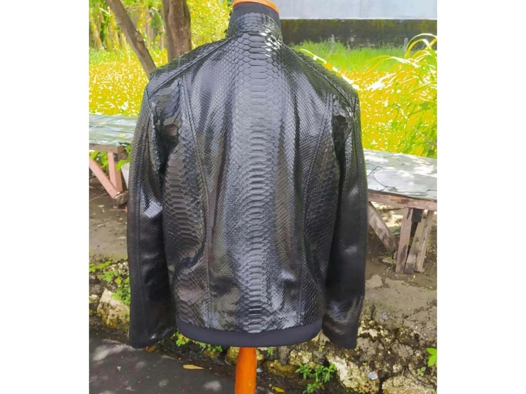 Black snakeskin leather jacket with gold-tone zippers, back view