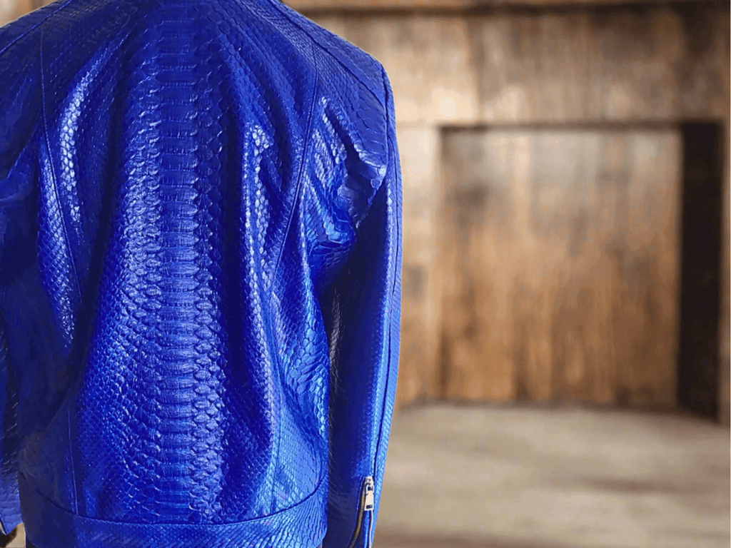 Blue python leather jacket back view, textured snake-skin finish and shoulder seam