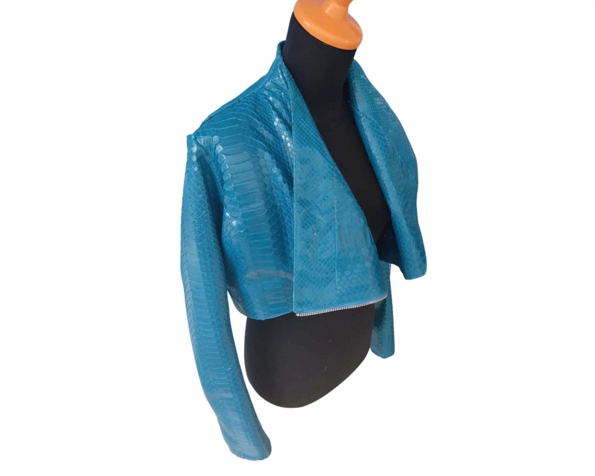 Turquoise bolero jacket with textured look and short sleeves, asymmetric drape