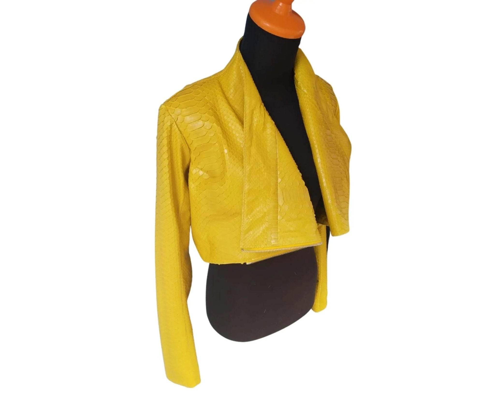 Yellow bolero jacket with long sleeves and textured fabric, open draped front