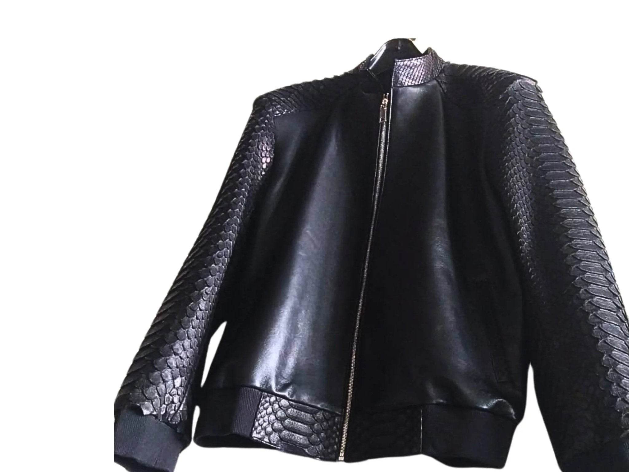 Black bomber leather jacket front three-quarter view with ribbed cuffs and zipper