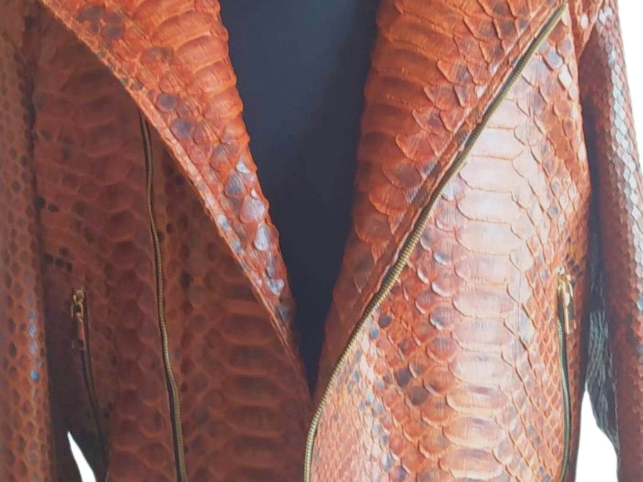 Brown snake-scale leather jacket front with diagonal zip and pointed lapel