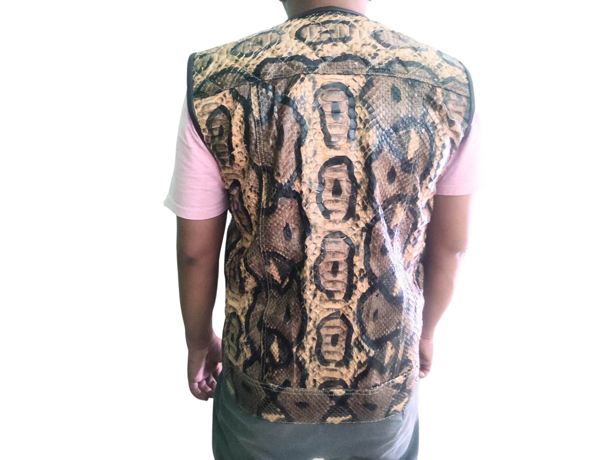 Motorcycle leather vest, rear view with tan and dark patterned yoke and collar.