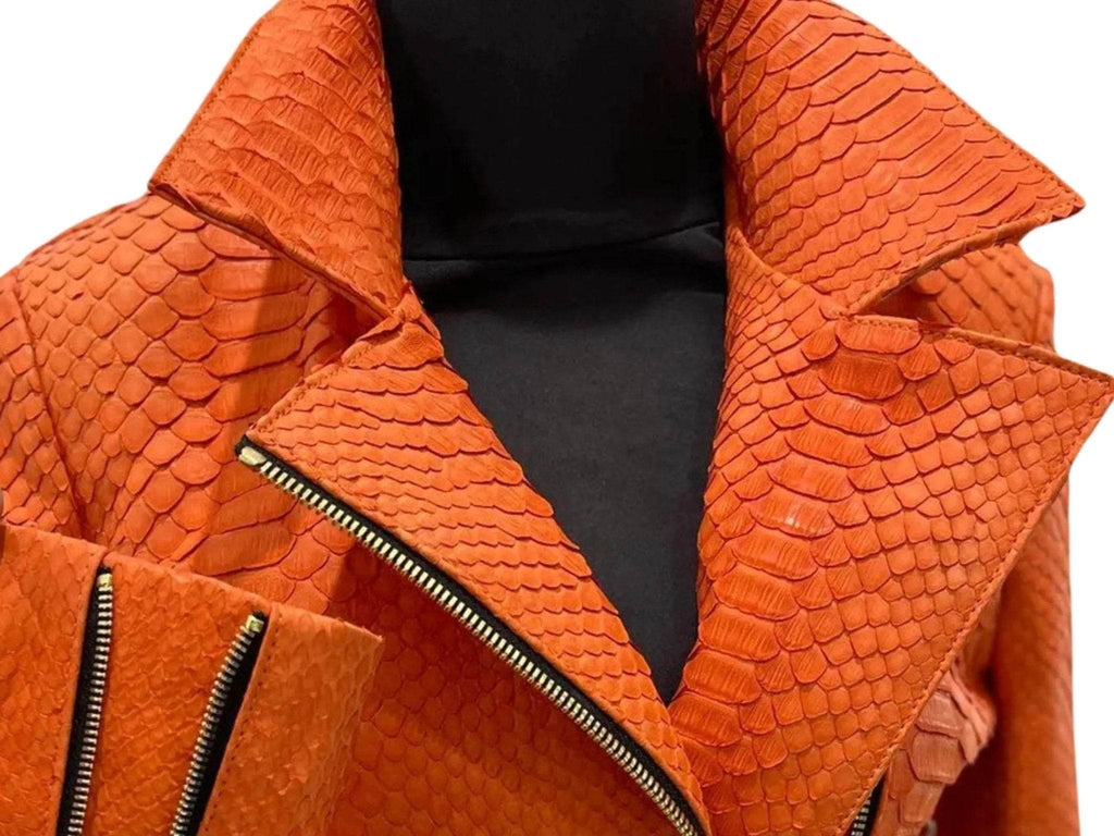 Snakeskin leather jacket close-up with pointed collar and black inner
