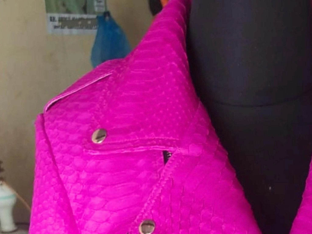 Hot pink snakeskin leather jacket shoulder with snap button and textured panel