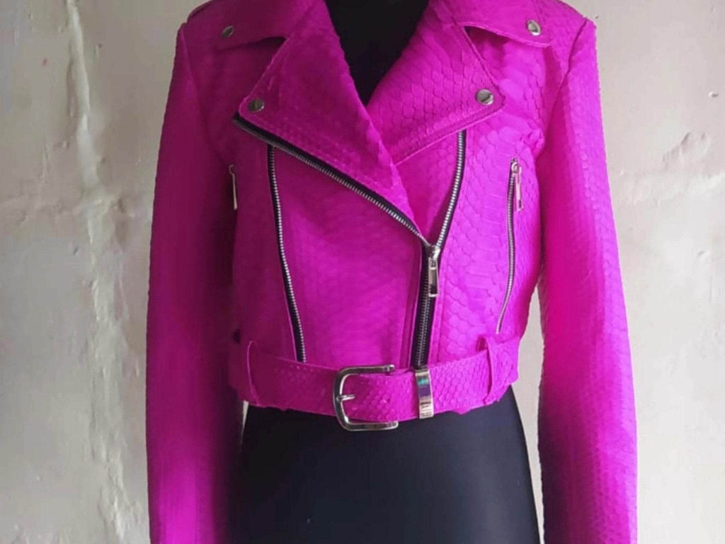 Hot pink snakeskin leather jacket with asymmetrical zip front and wide belt strap
