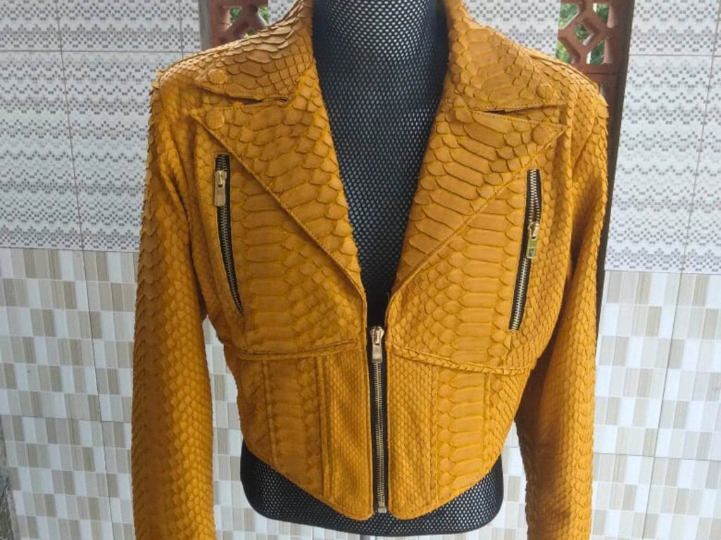 Cropped snakeskin leather fashion jacket, yellow, front view on mannequin with center zipper