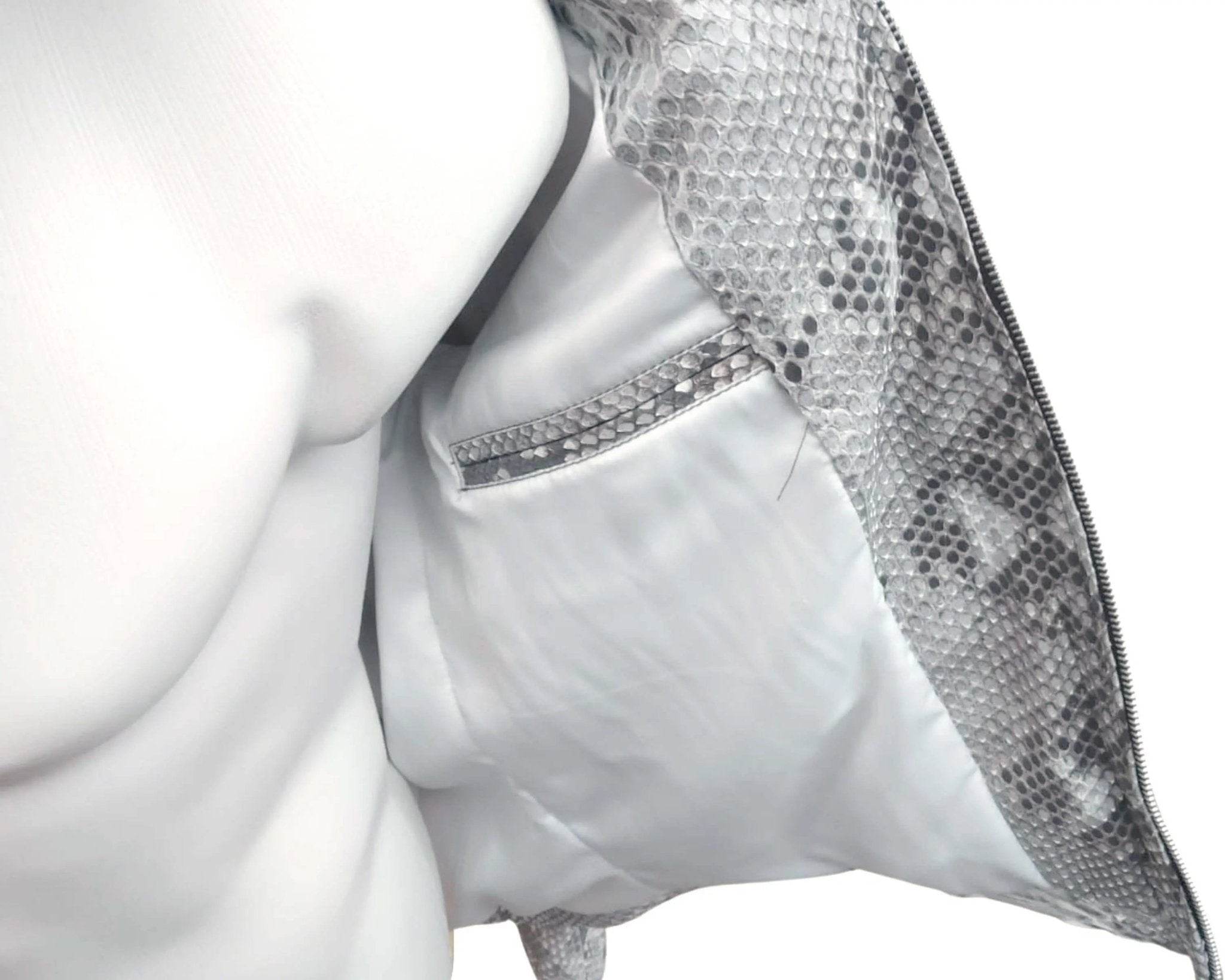 Snakeskin leather jacket interior lining with white panels and zipper area