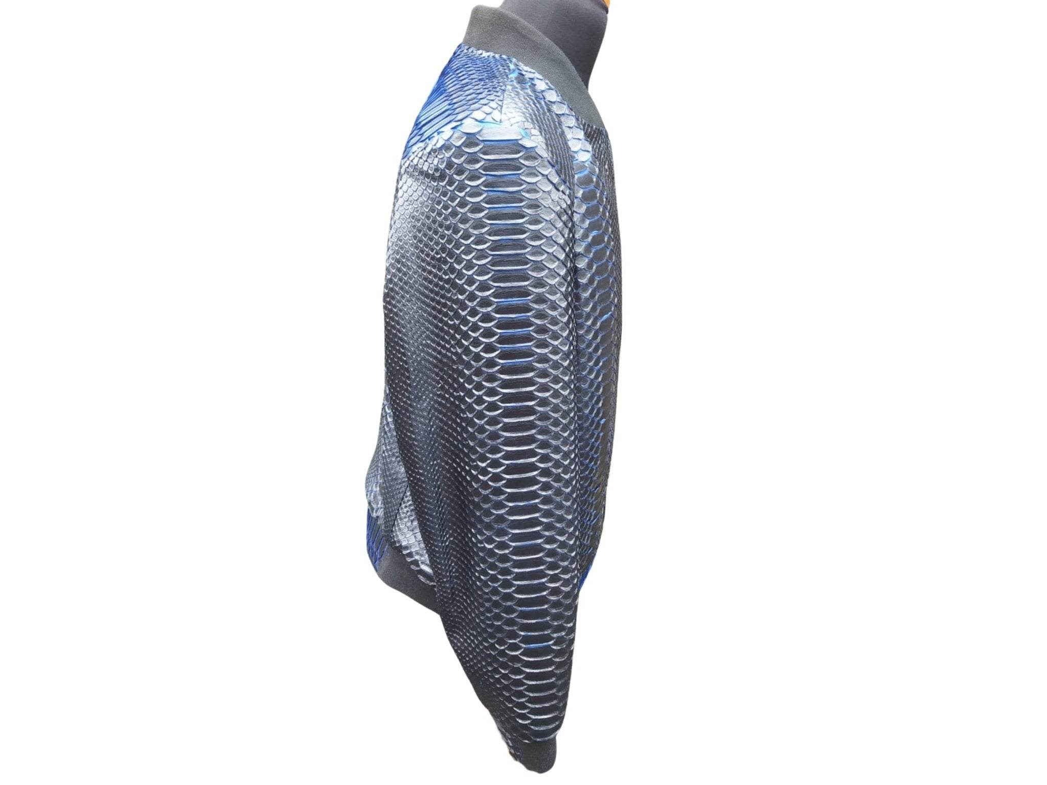 Snakeskin bomber jacket side view in silver-blue with zip front and ribbed hem