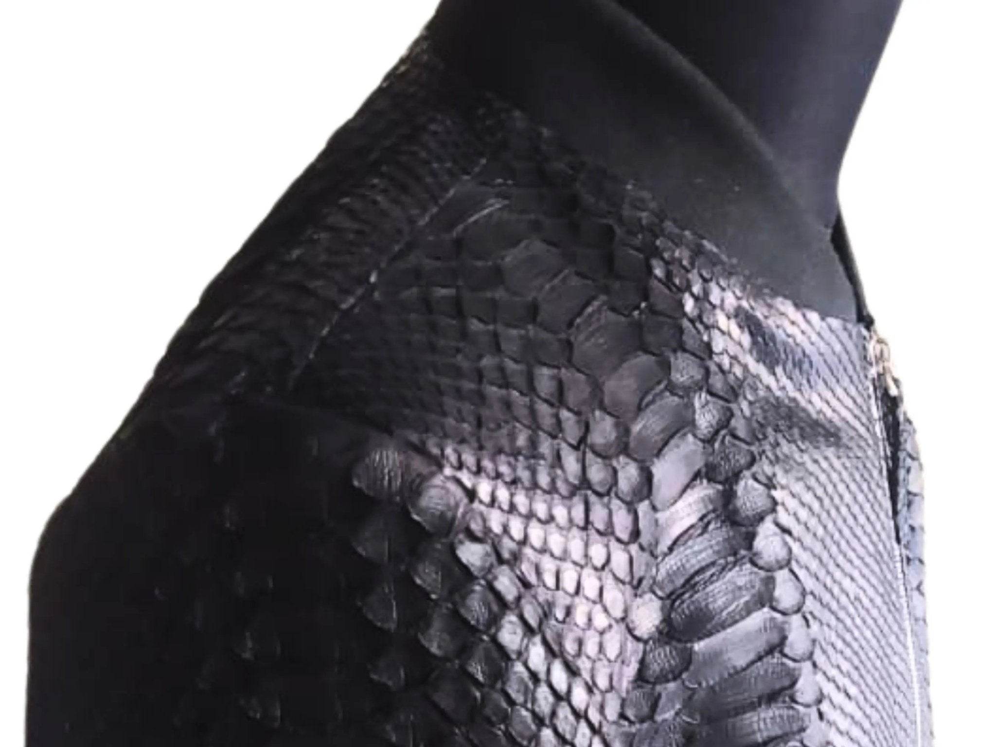 Black and gray snakeskin leather jacket shoulder and sleeve texture detail