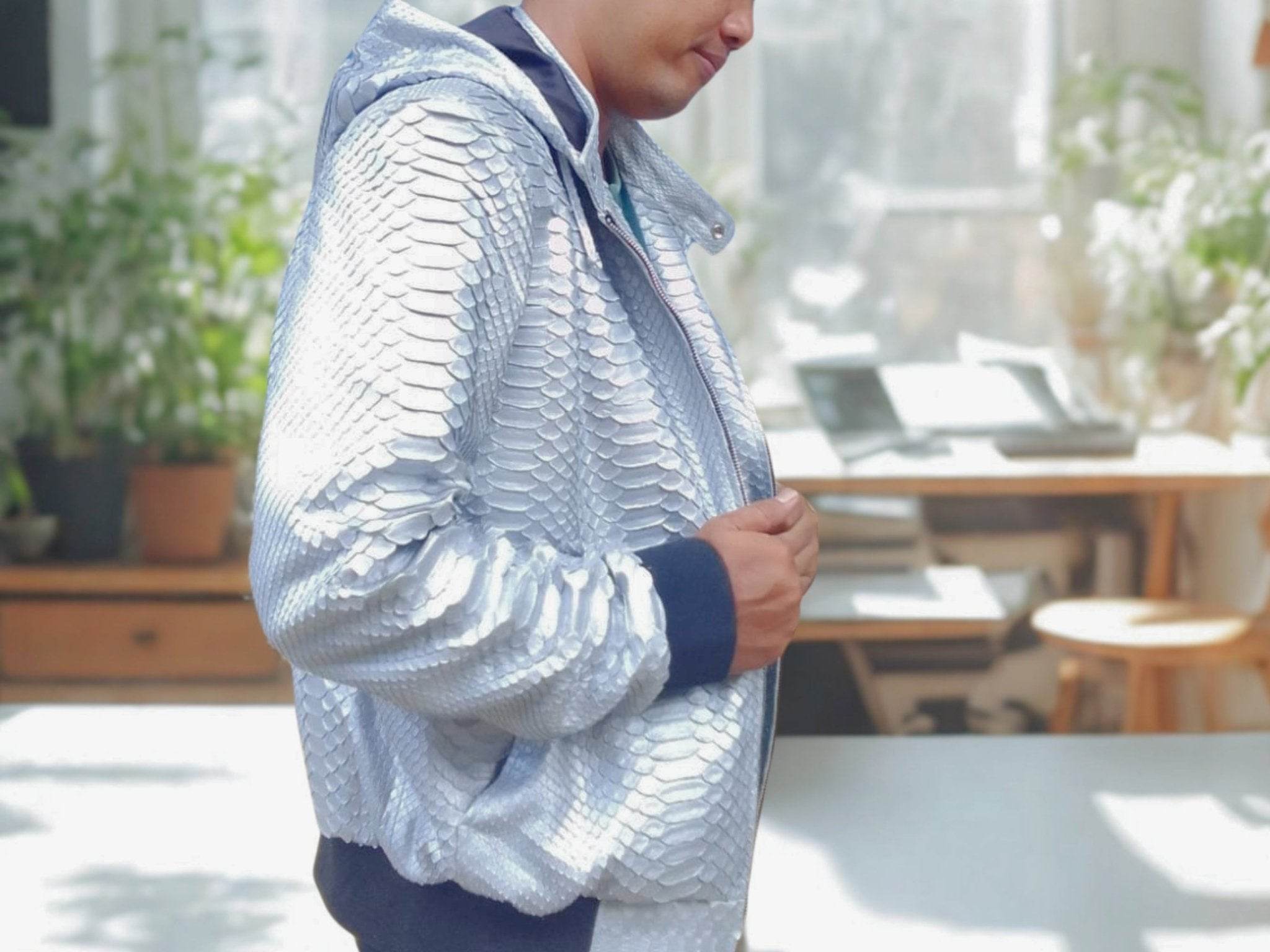 Light blue snakeskin-pattern hoodie jacket sleeve and side view, full zipper.