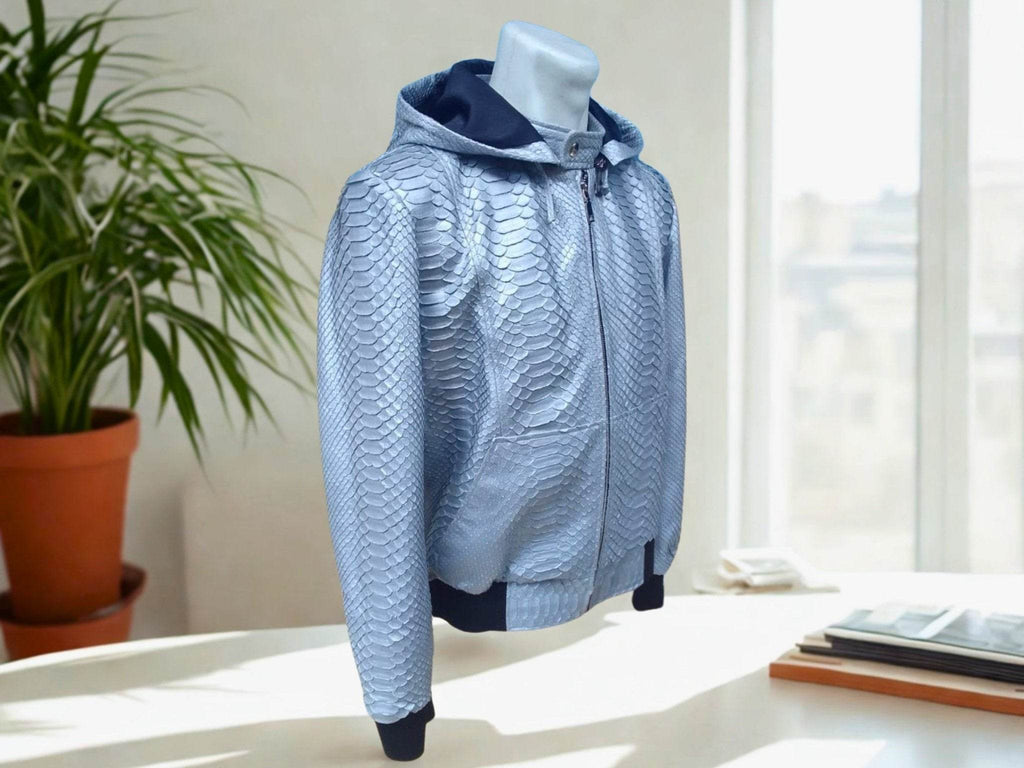 Light blue snakeskin-pattern hoodie jacket, front view with full zipper and hood.
