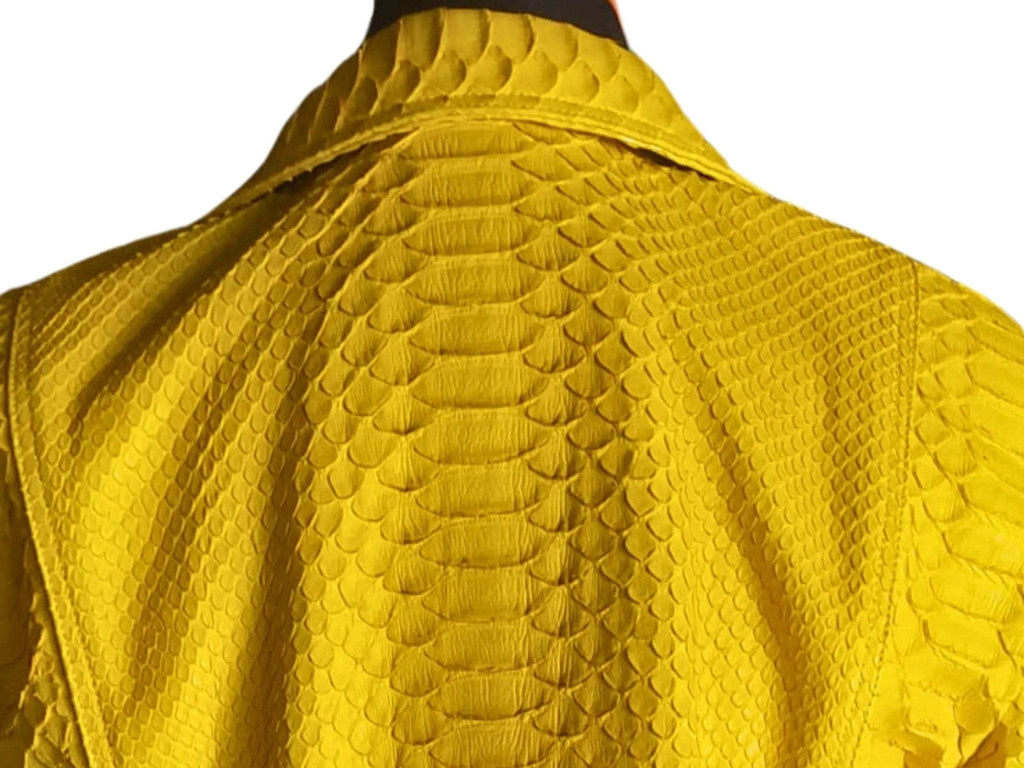 Yellow snakeskin-texture jacket back view with curved yoke seam