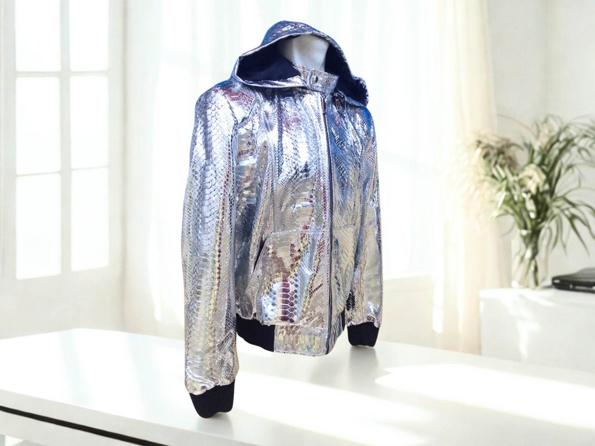 Snakeskin-style hooded leather jacket on model, silver patterned hood and zip front