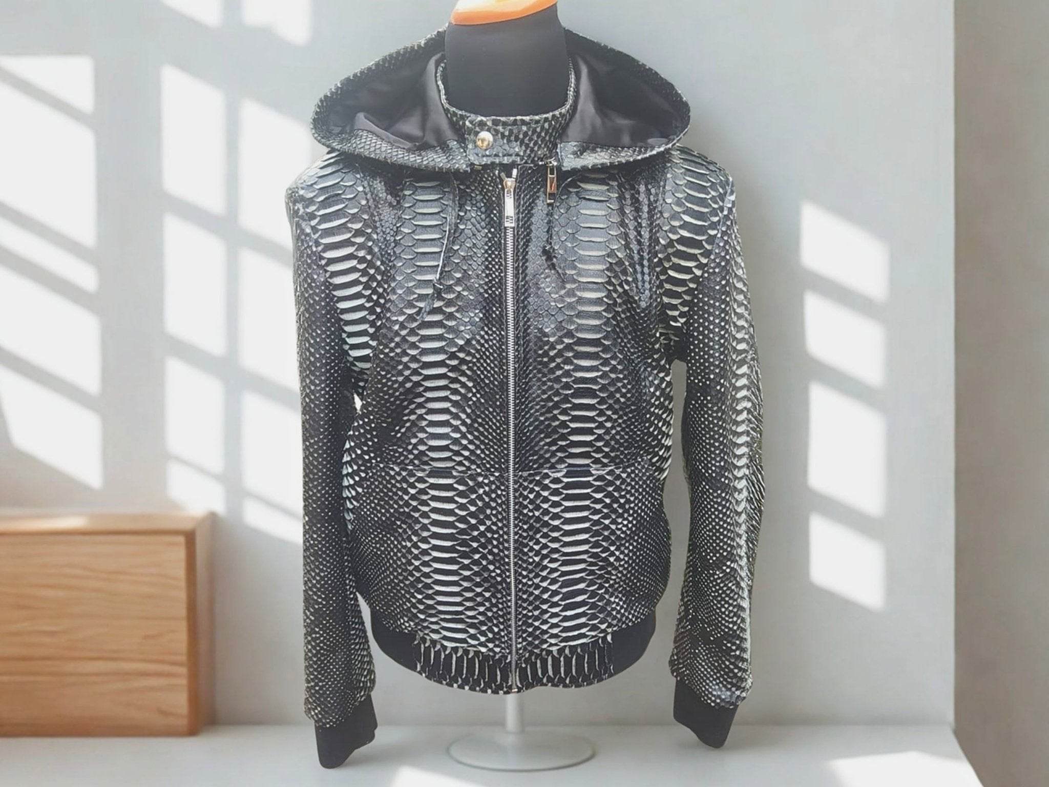 Snakeskin leather varsity jacket with stand collar and front zipper, no hood attached.