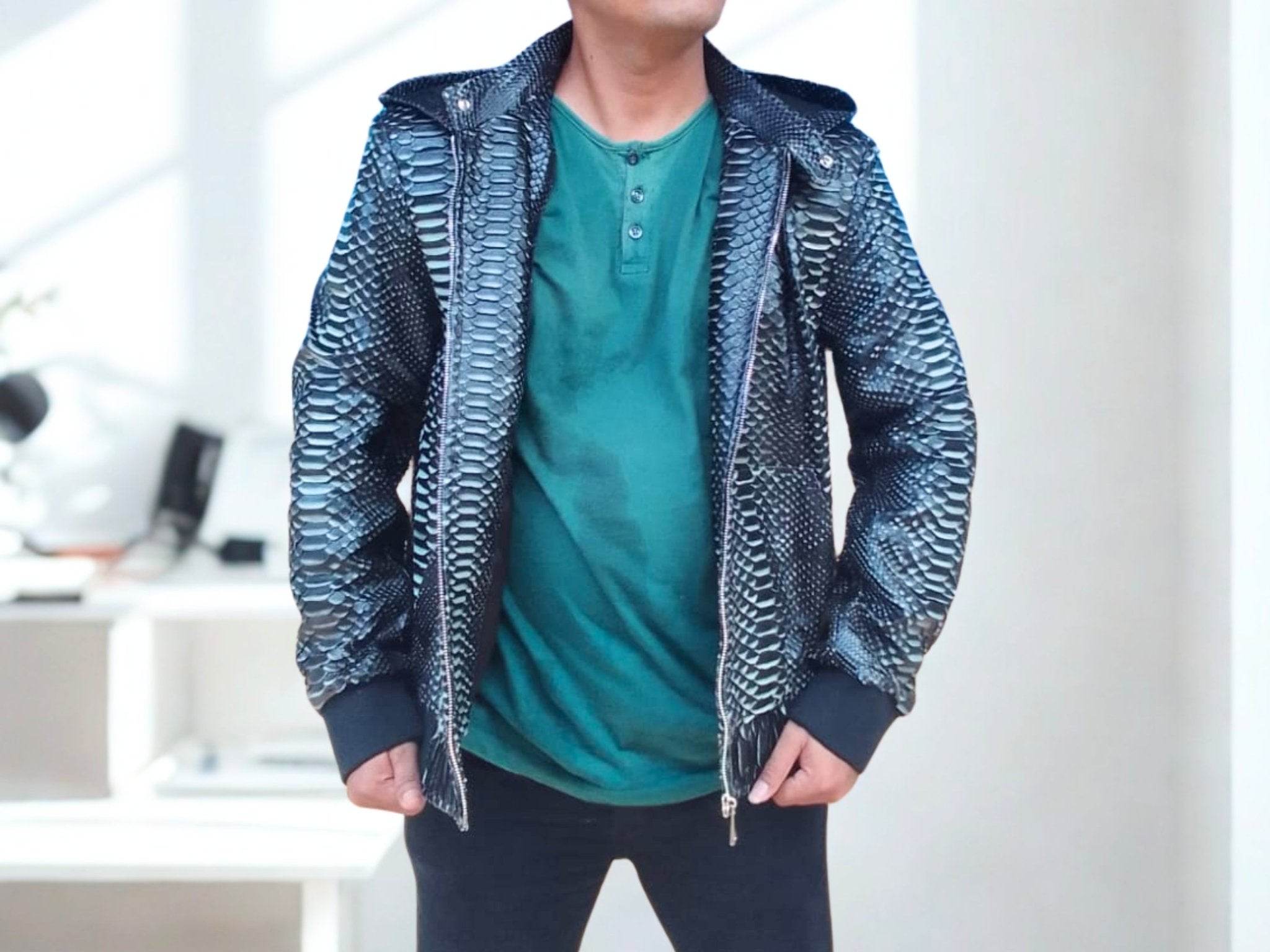 Snakeskin leather varsity jacket with removable hood and front zipper, ribbed hem.