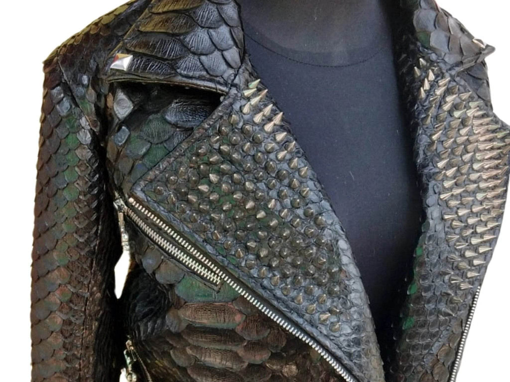 Close-up of snakeskin leather jacket with diagonal zipper and textured scale pattern
